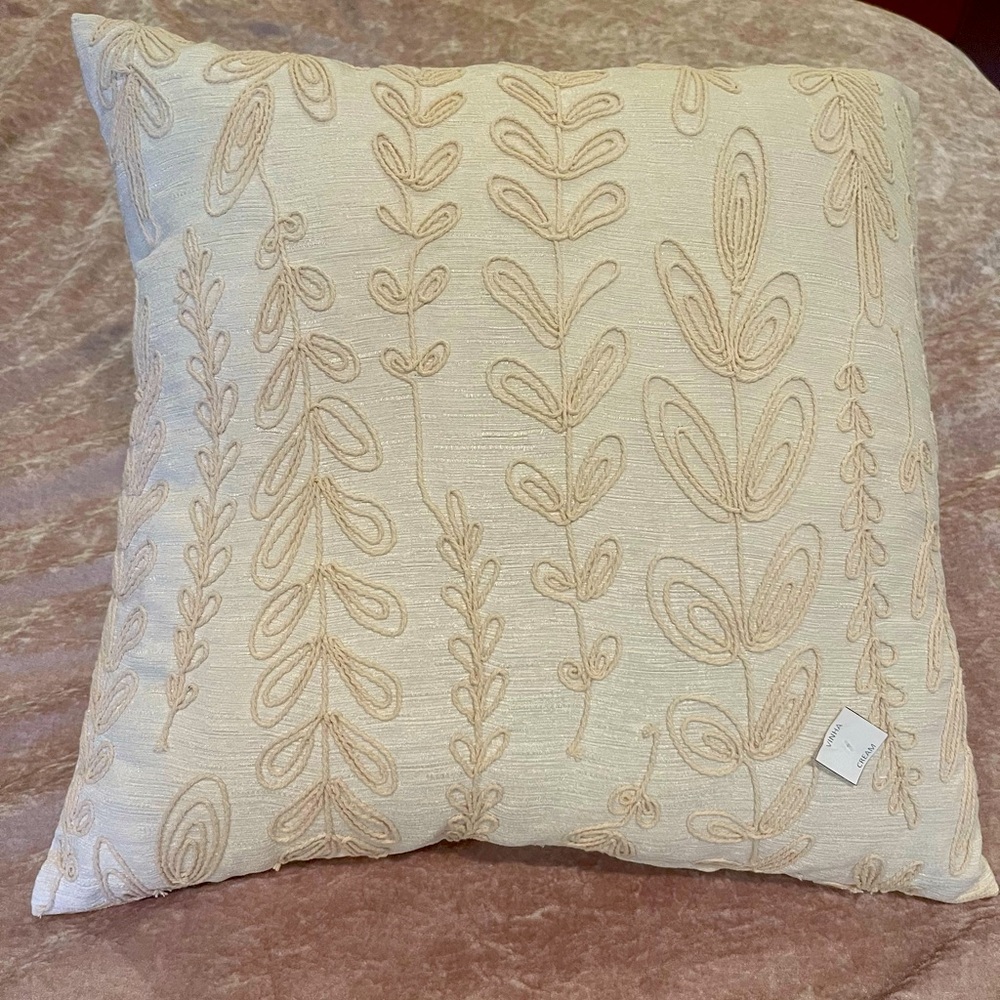 Brand new cream throw pillow 18”x 18”